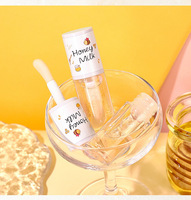 Huile à Lèvres Personnalisée en Gros, Marque Privée, Naturelle, à Base de Plantes, Hydratation Intense, Anti-Gerçures, Repulpante, Lissante, Réparatrice, Brillante, Miel et Lait