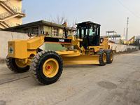 Matériel de construction en bon état, niveleuse Caterpillar 140H d'occasion