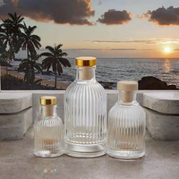 Bouteille diffuseur de parfum ronde en verre pour décoration intérieure 50ml/100ml/200ml avec bouchon en liège et impression sérigraphiée pour huile aromatique vide