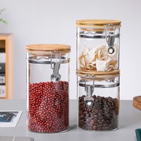Verre borosilicate multi-fonctions ustensiles de cuisine ménagers verre réservoir alimentaire conteneur bocal de stockage en verre avec pince en acier inoxydable
