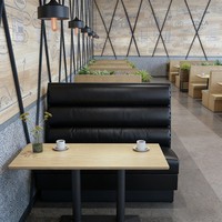 Ensemble de canapés écologiques en cuir noir à dossier haut avec structure en bois pour restaurant