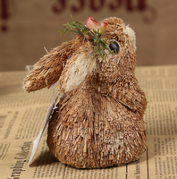Arts et artisanat d'animaux mignons petit lapin renversé décorant avec des accessoires de fleurs de poussées