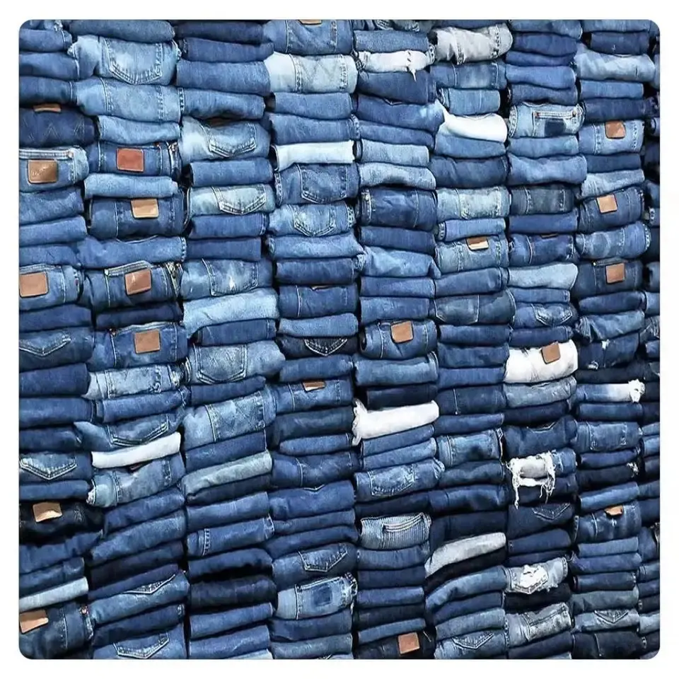 Abbigliamento in eccedenza con etichette di marca da uomo pantaloni in Denim da ragazzo Super a basso prezzo pantaloni jeans Jeans Skinny dritti