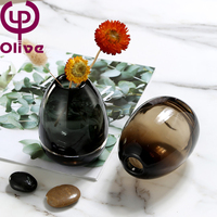 Fabrik Großhandel eiförmige schmale Mundglas Blumenvase Bernstein graue Farbe mit silbernem unteren Rand für Hochzeiten Niedriger Preis
