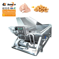 Friteuse continue de casse-croûte de granule bouffée de maïs de riz soufflé faisant la ligne de friture d'écorces de porc de machine