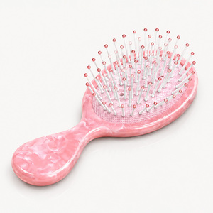 Brosse démêlante mini en acétate rose perle avec coussin d'air, picots en nylon antistatiques, style mignon pour adultes - Product Image 2