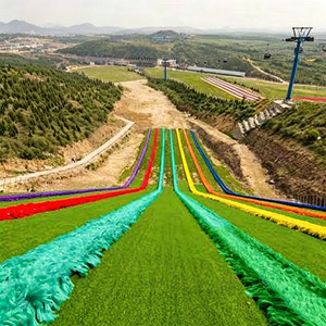 Piste de ski sèche commerciale arc-<span class=keywords><strong>en</strong></span>-ciel pour centres de loisirs <span class=keywords><strong>en</strong></span> plein <span class=keywords><strong>air</strong></span>, terrains de camping et projets d'événements saisonniers - Product Image 2