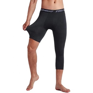 Men's Asymmetry Basketball Compression Tights Wholesale Mid Waist Solid Pattern Fitness <strong>Leggings</strong> with One Short Leg Pants - Product Image 1