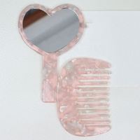 Mignon peigne à cheveux portable en acétate vintage en forme de cœur avec miroir intégré pour femmes