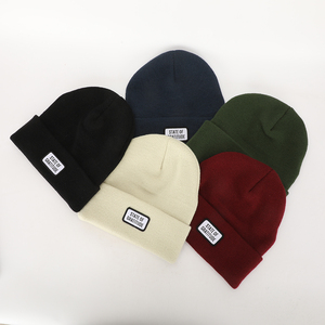 Unisex 100% in acrilico inverno caldo berretto da sci ricamo personalizzato tessuto Logo cappello in tinta unita di alta qualità