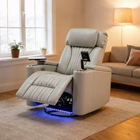 Fauteuil inclinable électrique moderne en cuir avec éclairage LED sur la base, table d'appoint, porte-gobelets, support pour téléphone et mouvement coulissant pour la maison