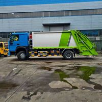 Camion Compacteur de Déchets Diesel Euro 3 Manuel 4x2 Howo 15m³ de Haute Qualité à Chargement Arrière pour le Transport et la Compression des Déchets