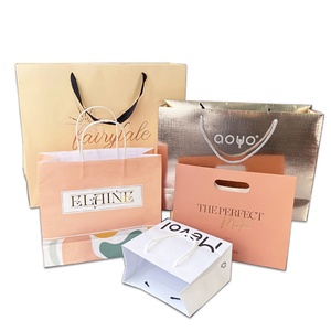 Wholesale Recycled Bolsas Printed Own Logo Packaging Shopping Bags Foldable Branded Retail Clothing White Brown Kraft <b>Paper</b> Bags - Product Image 1