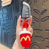Porte-clés pendentif en peluche mignon dessin animé Madonna tricoté étudiant cartable suspendu jouet petit cadeau en gros pour les couples