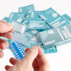 Tiras Blanqueadoras de Dientes con Menta, Amigables con el Esmalte, Ajuste Invisible, Blanqueamiento Intensivo, Caja de 250 Unidades - Product Image 4