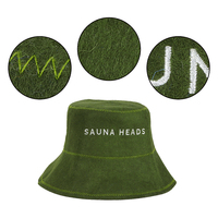 Chapeau de sauna en pure laine avec un sceau brodé or qui transforme la chaleur en un bruit lointain
