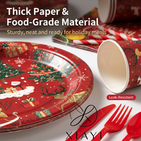 Ensemble de vaisselle de table décorative à thème de Noël, comprenant des assiettes en papier argentées imprimées de motifs rouges, des gobelets en papier et des serviettes en papier, pour les fêtes