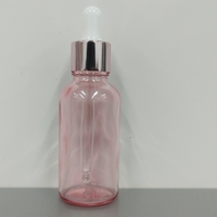 Bouteilles d'huiles essentielles personnalisables de haute qualité 5ml-100ml, flacon compte-gouttes en verre rose à col, prix bas, fabricant professionnel