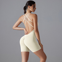 Combinaison de yoga et fitness moulante et très élastique, de haute qualité, avec effet push-up fessier, dos croisé et sans coutures apparentes