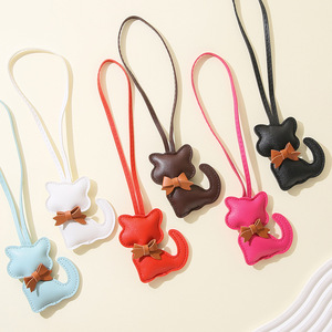 Mignon porte-clés pendentif chaton en cuir PU avec nœud papillon, style dessin animé créatif, pour sac à main, sac à dos et accessoires féminins - Product Image 1