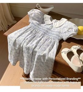 <span class=keywords><strong>Vestito</strong></span> per bambini all'ingrosso tessuto <span class=keywords><strong>con</strong></span> stampa a farfalla di cotone <span class=keywords><strong>con</strong></span> colletto e maniche corte a maniche corte <span class=keywords><strong>vestito</strong></span> Smocked per bambine - Product Image 4