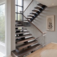 Escalier en acier à monopoutre avec supports d'escalier individuels et main courante fine pour architecture intérieure ouverte