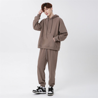 Ensemble de sweats à capuche unisexe personnalisables ODM avec logo, en coton épais, coupe oversize, imprimé coloré, grandes tailles, poches, anti-rétrécissement