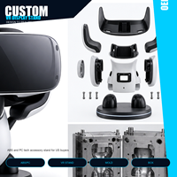 Service de développement de moules personnalisés pour présentoir de casque VR robot en ABS+PC, idéal pour les cadeaux de gamer et les décorations de bureau