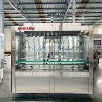 Machine de remplissage linéaire à gravité haute précision pour liquides à faible viscosité, pour ligne de production de bouteilles en plastique et en verre