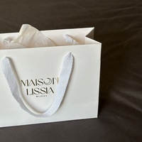 Sac fourre-tout en papier imprimé sur mesure de luxe avec poignée en coton doux pour cosmétiques et soins de la peau, sac de vente au détail pour marque