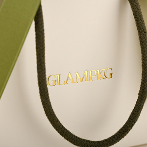 GLAMPKG - Caja de Joyería con Logotipo Estampado en Caliente Personalizado al por Mayor, Bolsa de Papel para Almacenamiento de Joyas con Asa de Listón para Regalo - Product Image 2