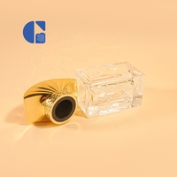 Flacon de parfum carré vide en verre transparent à fond épais de 30 ml, personnalisé OEM, avec couvercle en forme d'éventail doré de luxe