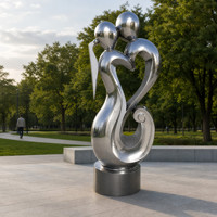 Sculpture d'art abstrait moderne en acier inoxydable poli miroir, motifs ajourés complexes, forme circulaire pour parcs et villas