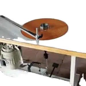 Machine de laminage de bandes élastiques et non élastiques pour machine semi-automatique d'emballage