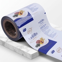 Film laminé personnalisé en rouleau pour machines d'emballage automatiques, film imprimé de qualité alimentaire pour snacks et biscuits