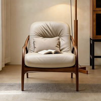 Fauteuil élégant et moderne en velours noir/cuir avec structure en bois distinctive – Idéal pour la détente dans un appartement ou une chambre – Léger et durable