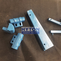 Pièces de concasseur Hyton B9600 VSI, jeu de pointes de rechange en acier au carbone moulé pour l'exploitation minière de minerai HT-B96394060B