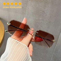 Nouvelles arrivées de lunettes sans cadre de marque de mode de haute qualité Designer de luxe femmes coupe de diamant lunettes de soleil teintées roses sans monture
