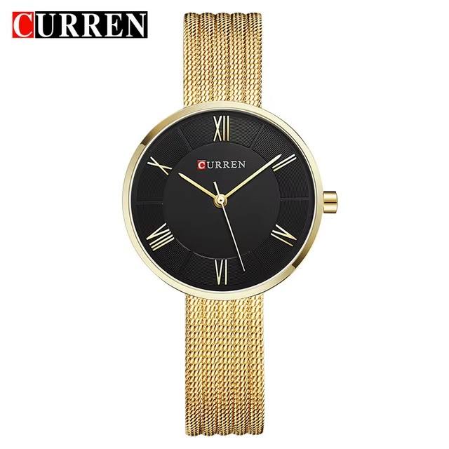 2 black dial gold strap