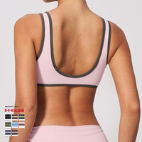 Soutien-gorge de sport respirant effet seconde peau avec couleurs contrastées et coussinets amovibles, idéal pour le Pilates, le yoga et le fitness, anti-transpiration pour femme