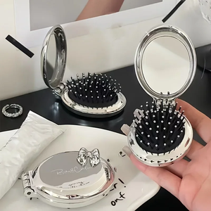 Mini pettine portatile a forma di fiocco-setole in Nylon cuscino d'aria pieghevole per capelli normali strumento per lo stile da viaggio con specchio