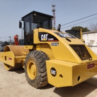 Compacteur vibrant CAT CS-683E d'occasion en bon état, 18,8 tonnes, rouleau à tambour unique, faible nombre d'heures de fonctionnement, prêt à l'exportation