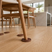Patins de protection antidérapants en silicone alvéolé pour pieds de meubles, chaises et tables, anti-rayures et anti-vibrations, fabriqués en Chine, emballés pour l'expédition.
