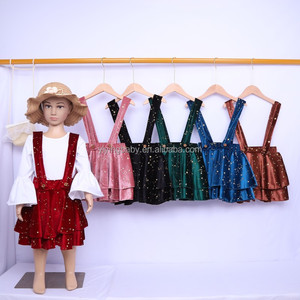 Vente en gros de nouvelles mini-robe en <span class=keywords><strong>velours</strong></span> scintillant à double sangle et étoiles pour filles salopette de boutique pour enfants <span class=keywords><strong>jupe</strong></span> à bretelles pour petites filles - Product Image 1