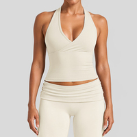 Nouvel ensemble de sport et yoga 2026 blanc et noir avec débardeur push-up et short pour femme
