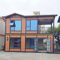 Casa Contenedor Modular de Panel Sándwich de Acero de 20 pies, de Instalación Rápida, Portátil, Desmontable, Resistente al Fuego y al Viento, para Hotel o Uso Rural