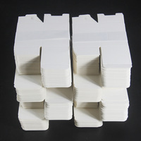 En stock, boîte en carton blanc uni portable haut de gamme pour parfums, huiles essentielles, cosmétiques, crème pour les yeux et blush