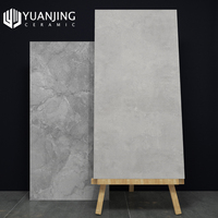 Carreaux de sol en porcelaine effet marbre gris marocain de luxe, lumière douce, 750x1500mm