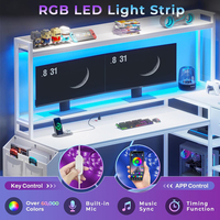 Grand bureau d'ordinateur de bureau réversible en forme de L avec prise de courant et bureau de jeu Pegboard avec lumières LED et plateau pour clavier