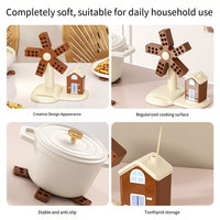 En gros, dessous de plat en silicone motif moulin à vent, multifonctionnel, pliable, résistant à la chaleur et antidérapant, pour la protection de la table de cuisine
